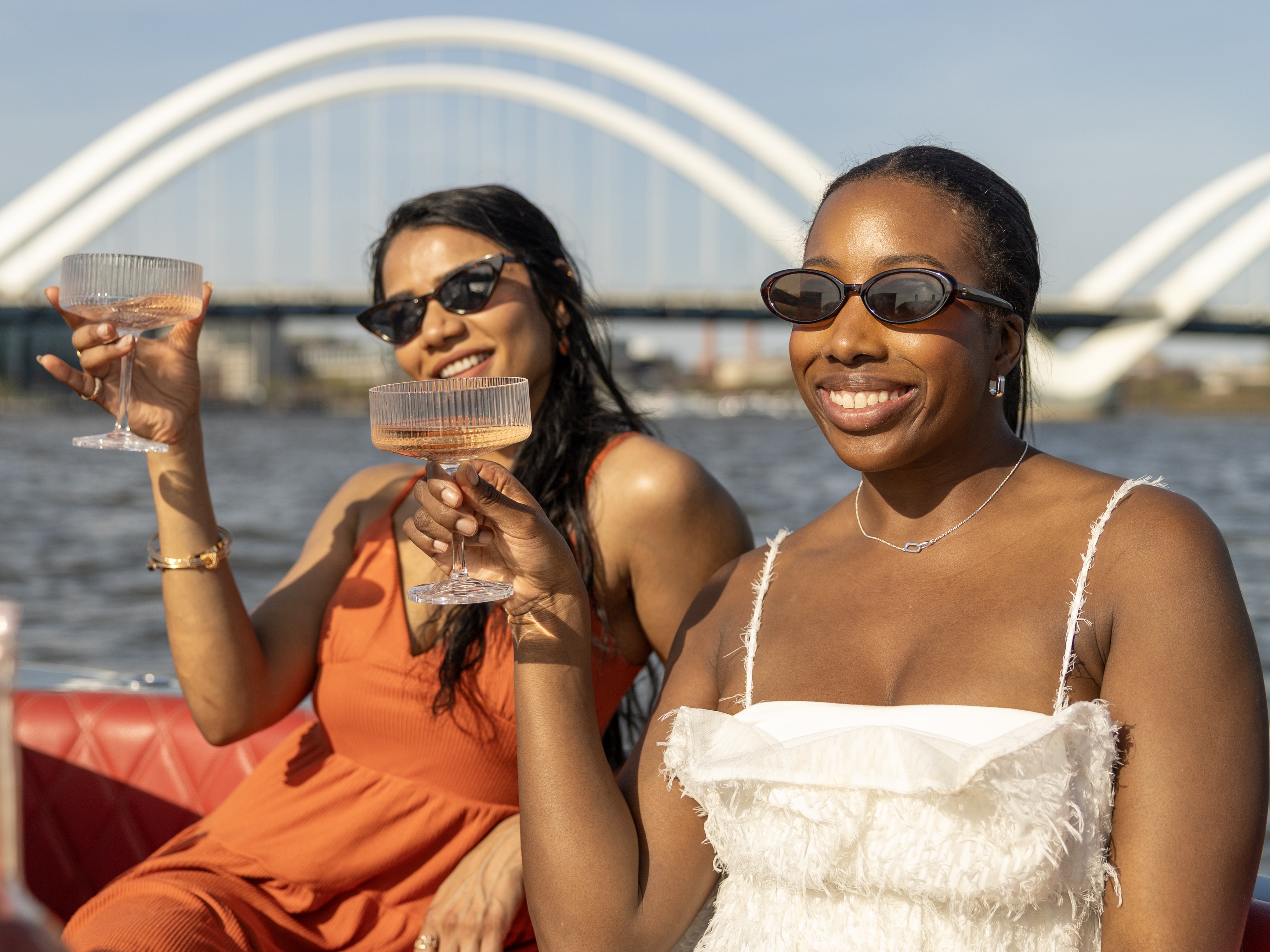 Bachelorette party toasting champagne on a private Yachtsy boat