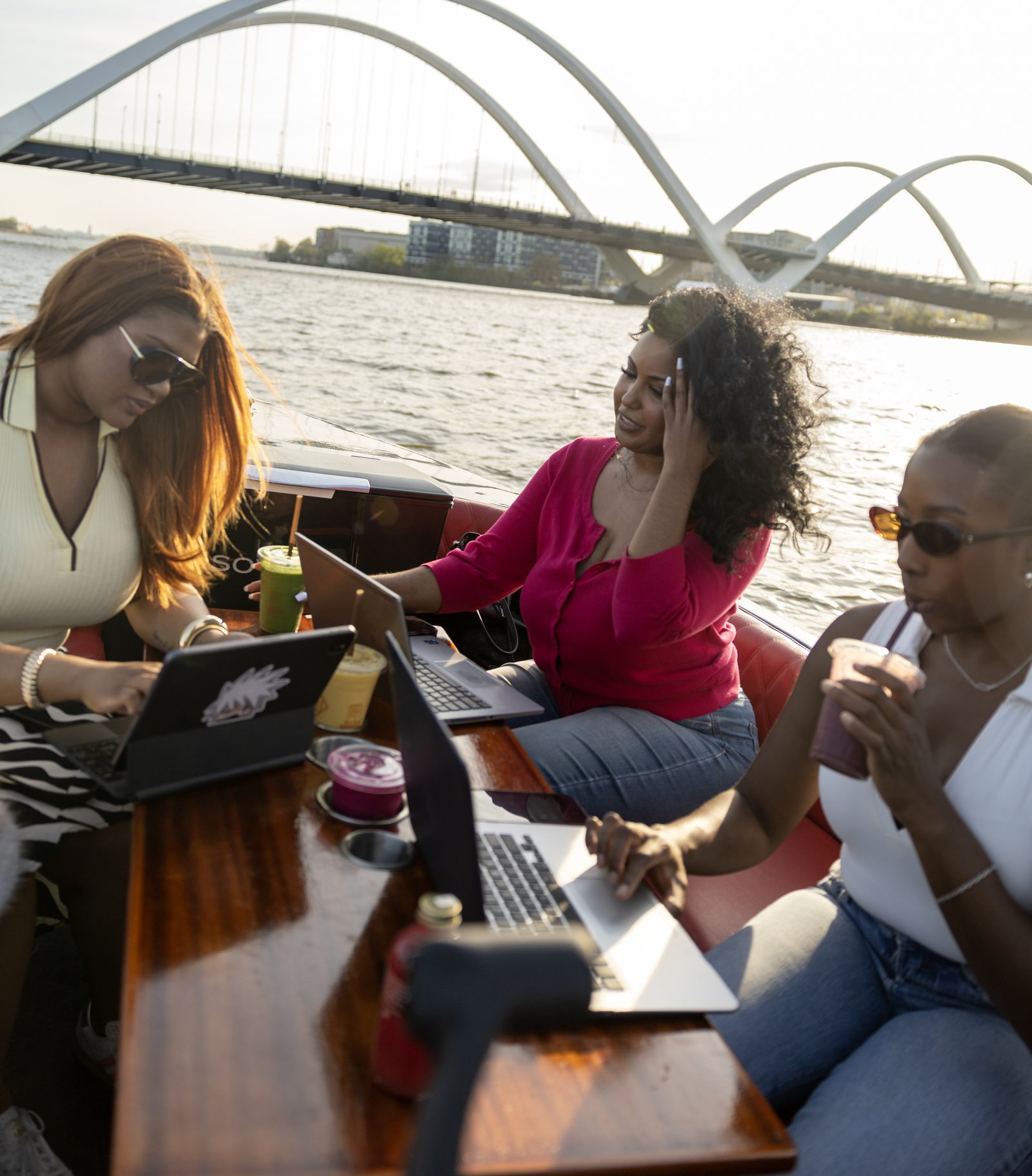 A team of coworkers enjoying a private Yachtsy picnic boat outing for a corporate event